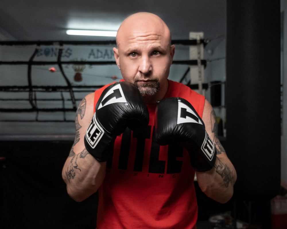 TITLE Boxing Pro Leather Bag Gloves 3.0 man wearing gloves