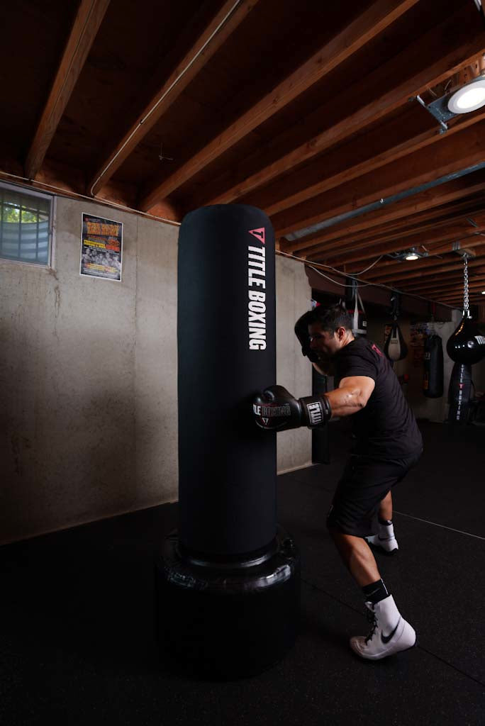 variant:white/black::Nike Shoes Machomai 2 guy punching a bag