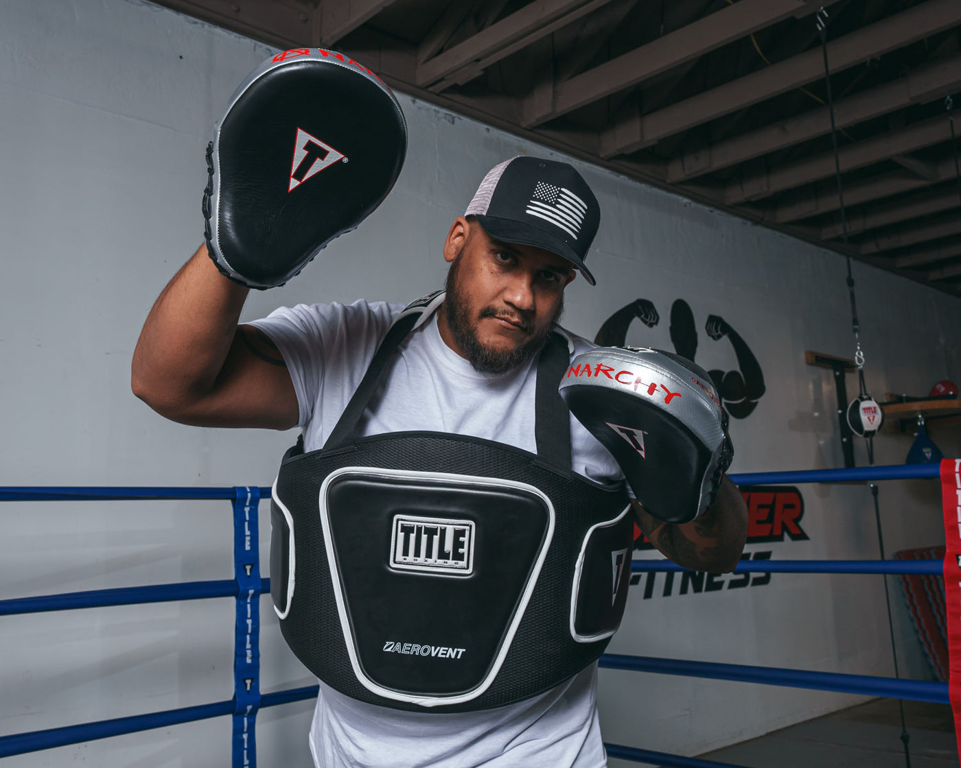variant:lifestyle::TITLE Boxing Aerovent Anarchy Punch Mitts  coach mitts up right hand