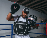variant:lifestyle::TITLE Boxing Aerovent Anarchy Punch Mitts  coach mitts up right hand