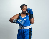 variant:blue::TITLE Boxing USA Boxing Competition Gloves girl boxing stance