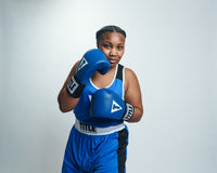 variant:blue::TITLE Boxing USA Boxing Competition Gloves girl boxing pose