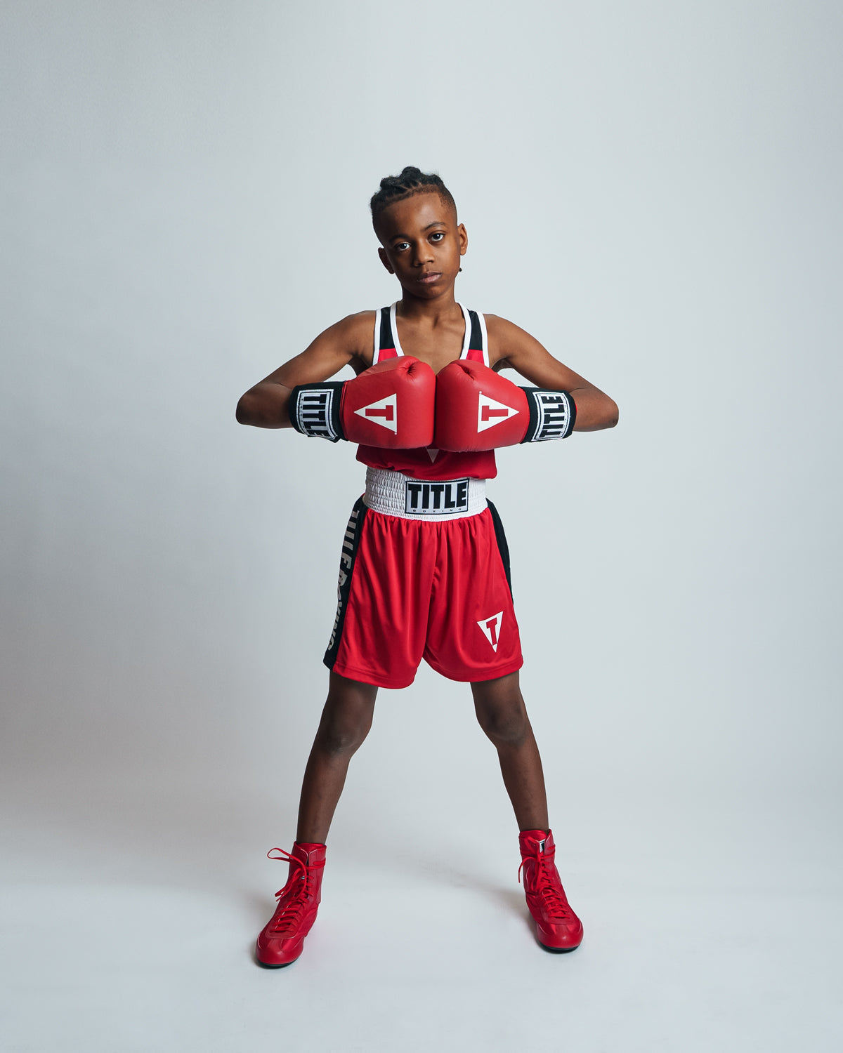 variant:red::TITLE Boxing USA Boxing Competition Gloves hands together