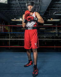 variant:blank black::TITLE Boxing USA Boxing Competition Headgear - Open Face guy boxing stance
