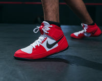 variant:Red/White/Black::Nike Fury Boots feet on ground