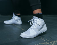 variant:White/Silver::Nike Fury Boots feet on ground