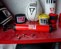 variant:lifestyle::TITLE Boxing Air Pump laying on table