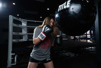 variant:lifestyle::TITLE Boxing Aqua Training Punch Bag girl boxing stance