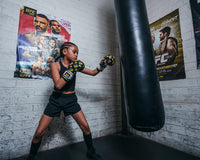 variant:lifestyle::BOOM BOOM Boxing Striker Youth Boxing Gloves 3.0 kid hitting bag