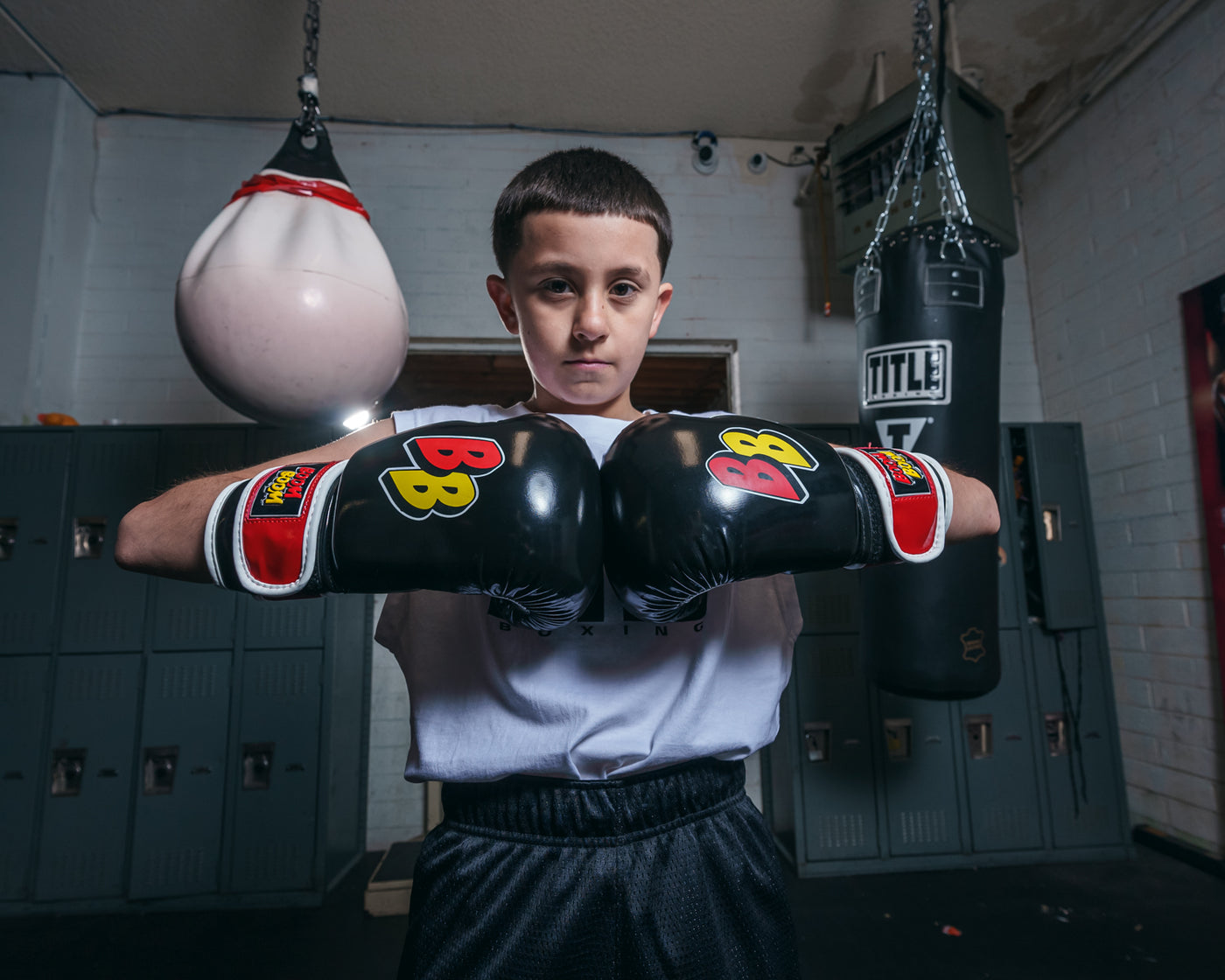 variant:Black/White/Red::BOOM BOOM Boxing Silencer Youth Bag Gloves hands together