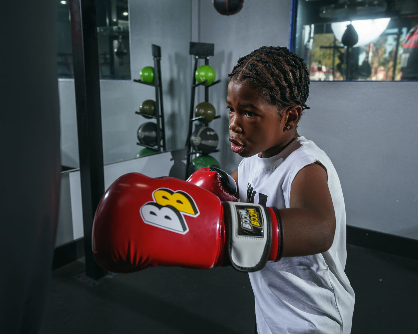 variant:Red/Black/White::BOOM BOOM Boxing Silencer youth bag gloves left jab on bag
