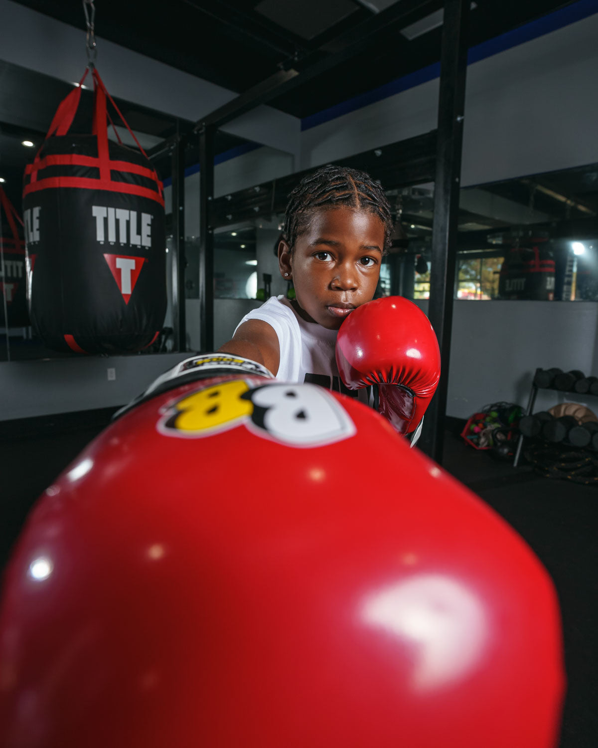 variant:Red/Black/White::BOOM BOOM Boxing Silencer youth bag gloves close up on glove