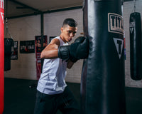 variant:lifestyle::TITLE Black Blitz Bag Gloves kid right jab bag
