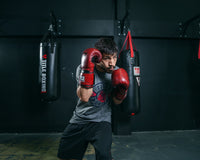 variant:lifestyle::TITLE Boxing Blood Red Leather Bag Gloves boxing stance