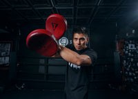 variant:lifestyle::TITLE Boxing Blood Red Leather Punch MItts trainer mitts cross