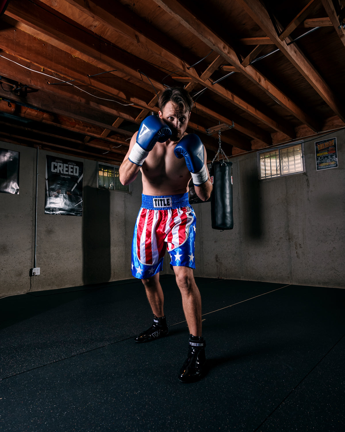 variant:lifestyle::TITLE Boxing USA Trunks on man