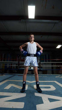 variant:blue::TITLE Classic USA Boxing Competition Gloves  hands on hip