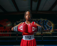 variant:red::TITLE Classic USA Boxing Competition Gloves girl hands together