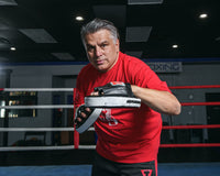 variant:lifestyle::TITLE Classic Panter Micro Mitts 2.0  coach left hand up