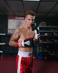 variant:Black/Red::TITLE Classic Pro Fight Gloves guy with hands up