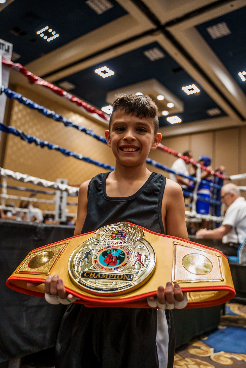 variant:gold::TITLE Boxing Gold Flash Title Belt kid holding belt