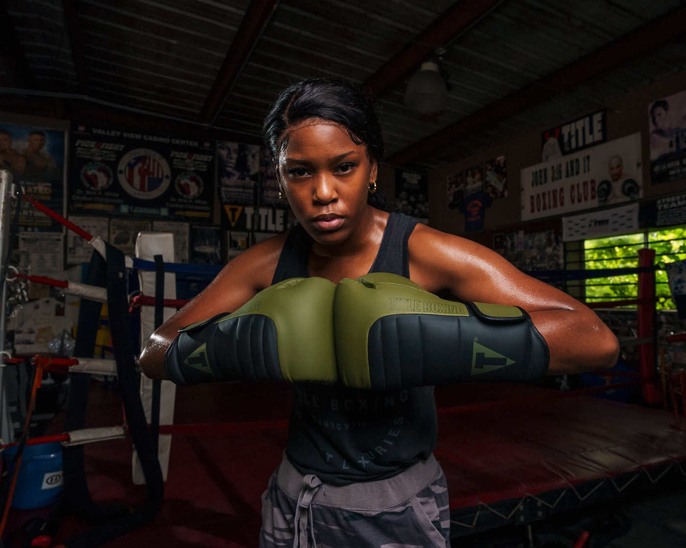 variant:Green/Black::TITLE Boxing Combat Bag Gloves 2.0 Girl with knuckles touching