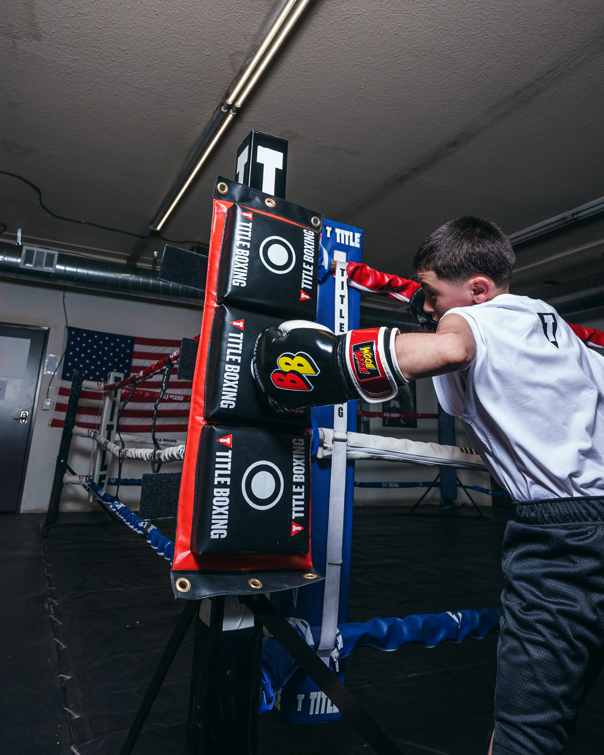 variant:lifestyle::TITLE Boxing Combination Punching Pad kid ring post right jab