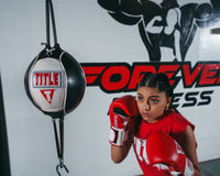 variant:red/white/black::TITLE Classic Leather Super Bag Gloves 2.0 girl hitting double end bag