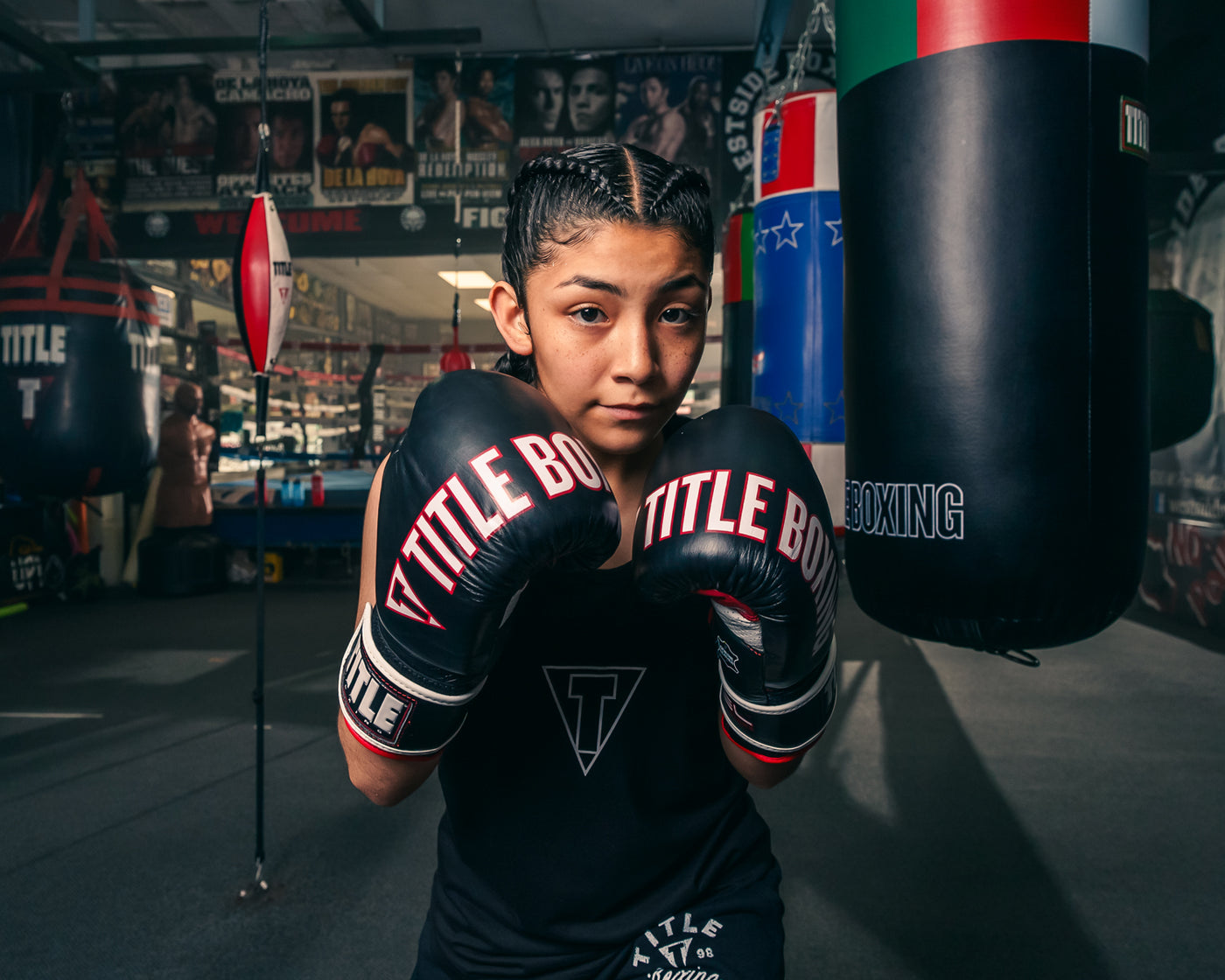 variant:Black/Red::TITLE Boxing Gel Soft Strike Bag Gloves girl  posing 