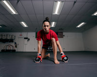 variant:lifestyle::TITLE Classic Wristwrap Heavy Bag Gloves hands on the ground