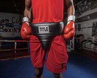 variant:lifestyle::TITLE Boxing Headgear and Groin Protector Bundle closeup of groin protector on boxer