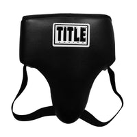 variant:lifestyle::TITLE Boxing Headgear and Groin Protector Bundle black groin protector front view