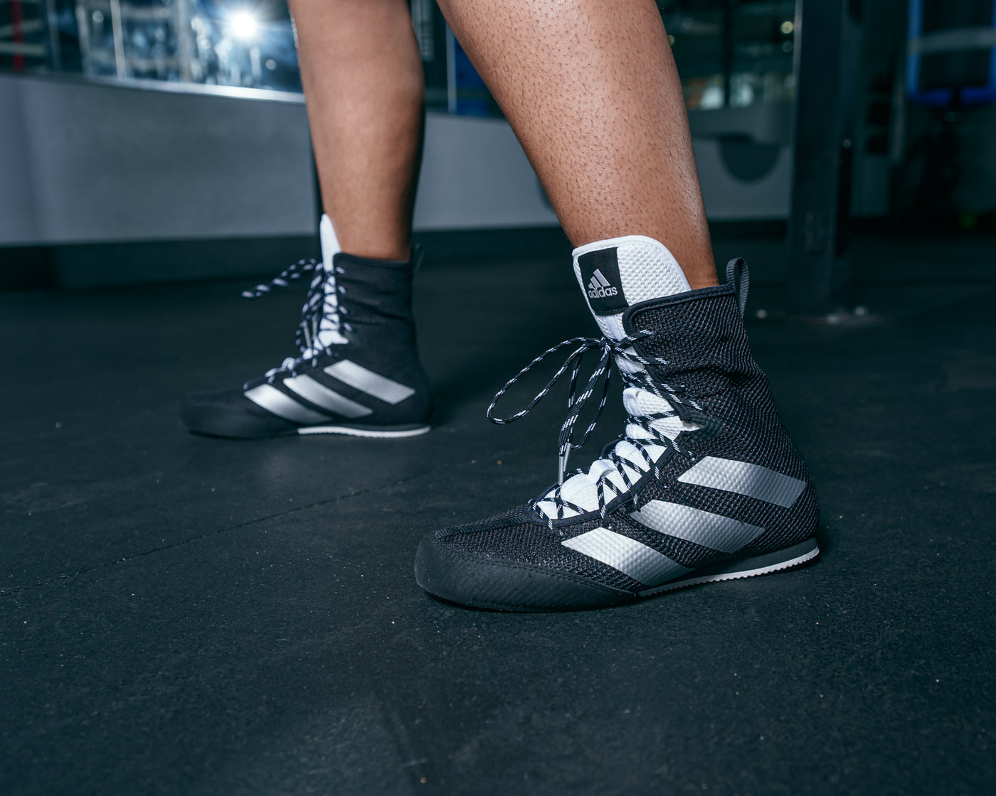 variant:Black/Silver::Adidas Box Hog 3 Boxing Shoes close up on feet