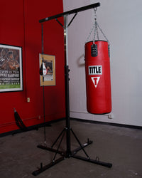 variant:lifestyle::TITLE Double Trouble Heavy Bag Stand red bag haning with speedbag