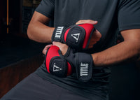 variant:lifestyle::TITLE Boxing Deluxe Weighted Gloves 2.0 kid close up of gloves putting on