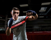 variant:REG::TITLE Boxing Elbow-In Trainer reg size being used by boxer