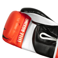 variant:Orange/Black/White::TITLE Boxing World Bag Boxing Gloves single glove palm view closeup