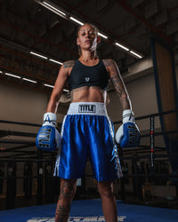 variant:lifestyle::TITLE Boxing Advanced Chest Guard & Compress Bra V2 girl in ring hands down
