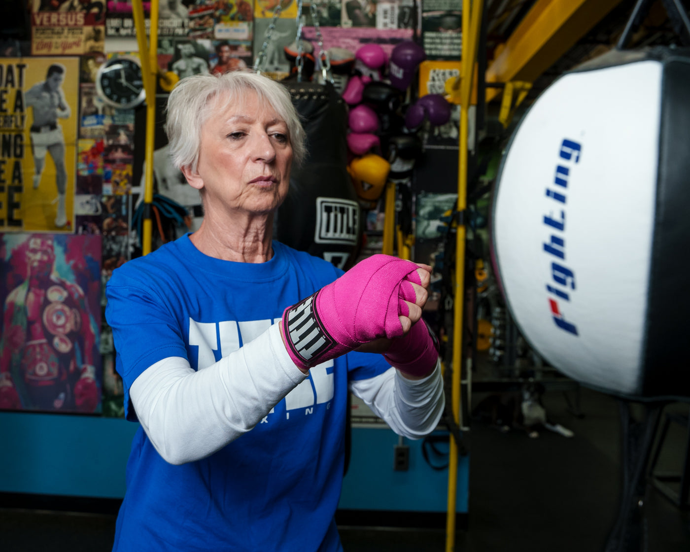 variant:Pink::TITLE Boxing Fight Back Semi-Elasitc Hand Wraps double end bag