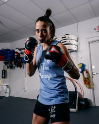 variant:lifestyle::TITLE MMA Full Contact Sparring Gloves girl boxing stance