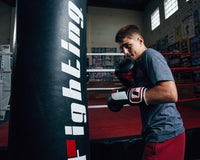 variant:black/red/white::Fighting Big Logo Boxing Gloves kid hitting bag