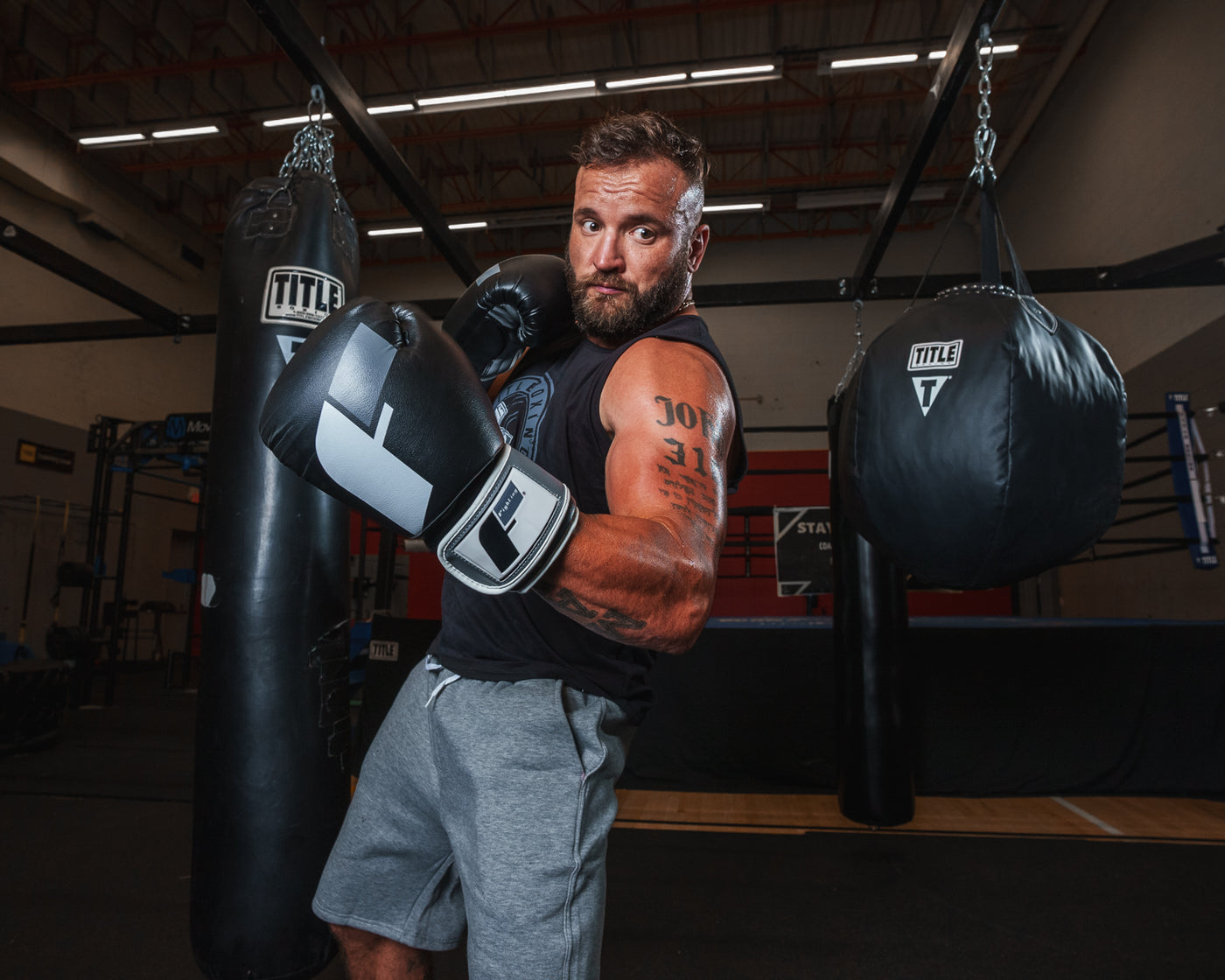 variant:Black/Grey::Fighting Sports Gloves and Wraps Bundle grey/black on boxer