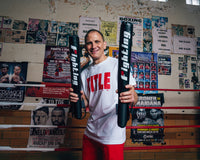 variant:lifestyle::Fighting Combat Striking Sticks sticks hands up with coach 