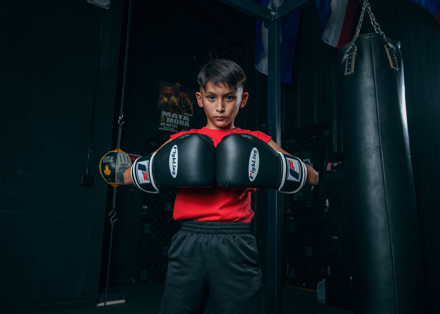 variant:black::Fighting Fury Professional Training Gloves kid hands together 