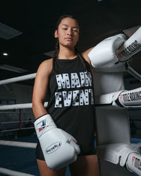 variant:white::Fighting Fury Professional Lace Training Gloves girl standing on ring post