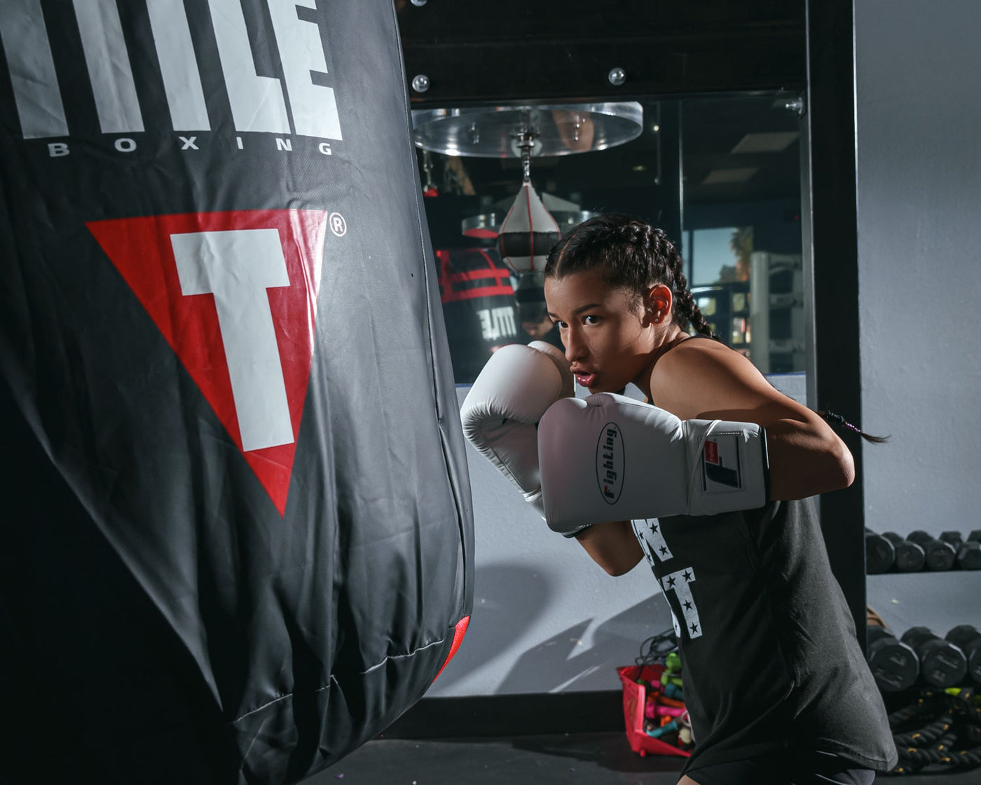 variant:white::Fighting Fury Professional Lace Training Gloves girl boxing stance with bag