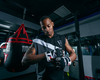 variant:lifestyle::Fighting S2 Pro GEL Glove Wraps  putting on