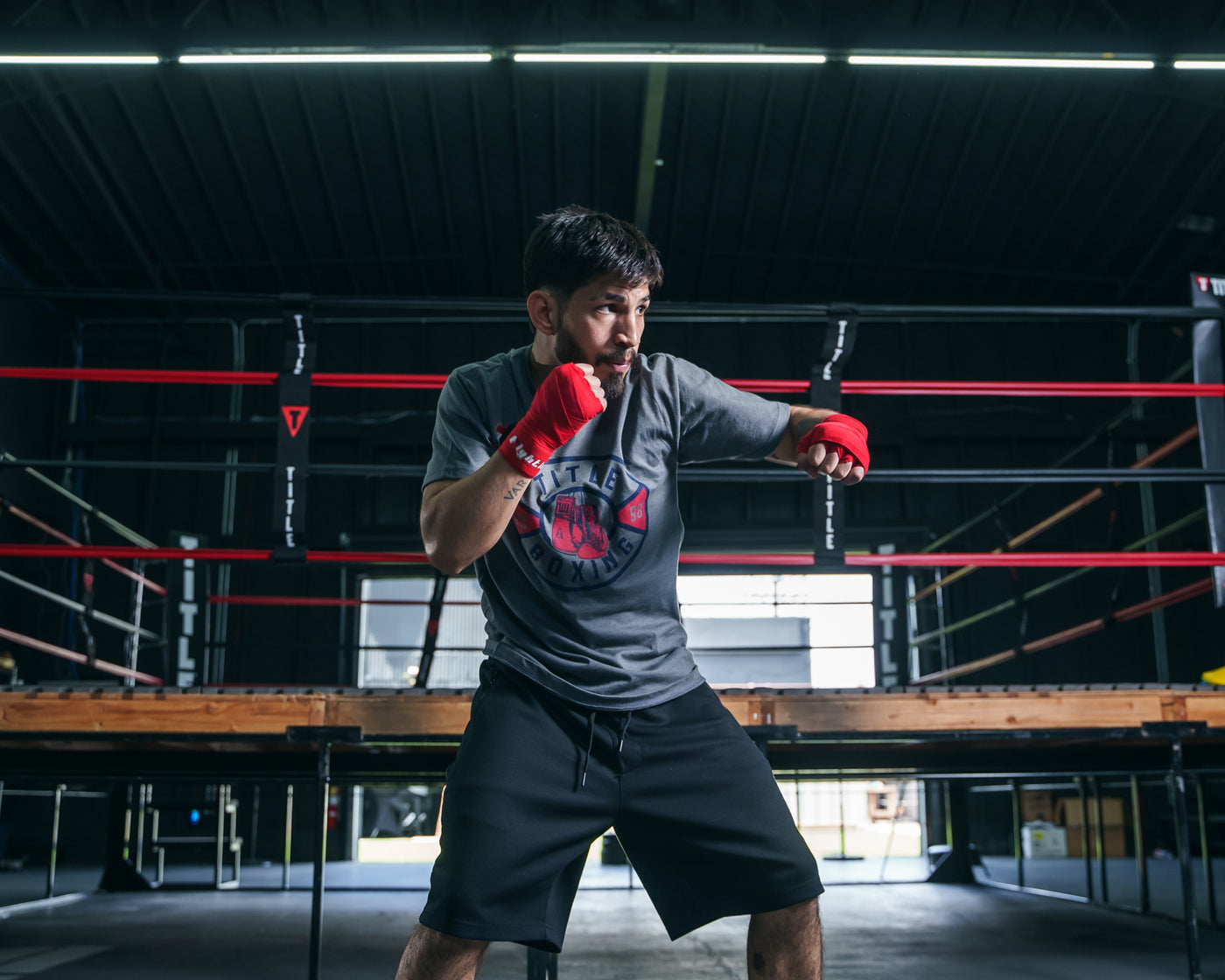 variant:Red::Fighting Semi-Elastic 180" Hand Wraps boy between hand wraps boxing stance