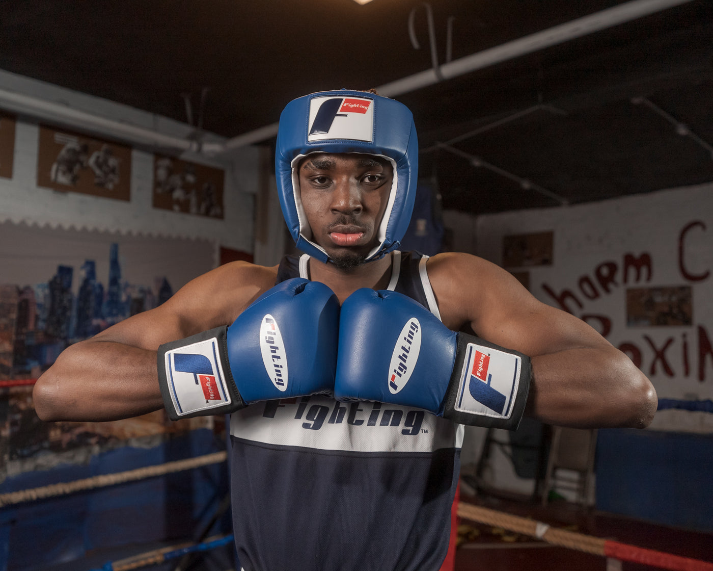 variant:blue::Fighting USA Boxing Competition Open Face Headgear guy in ring with gloves on to match blue
