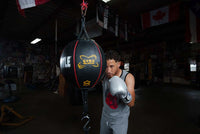 variant:lifestyle::TITLE Boxing Gyro Balanced Leather Double End Bag man punching bag